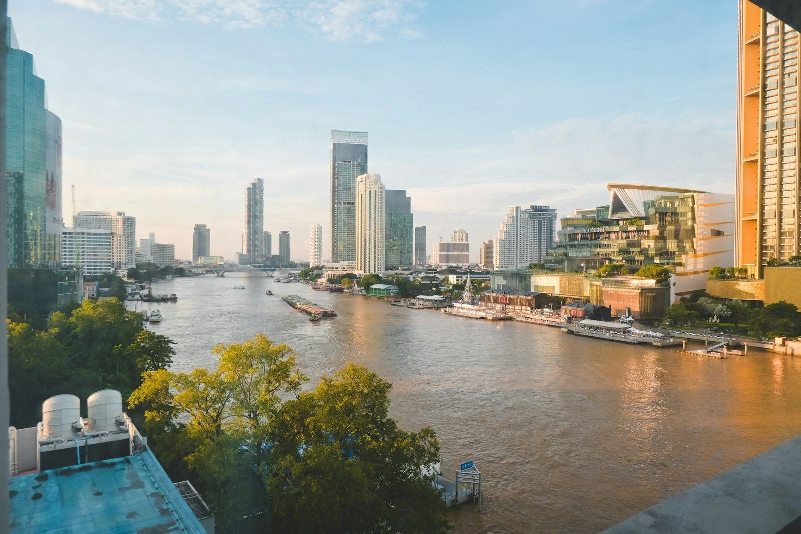 Bangkok skyline along the Chao Phraya river at sunset